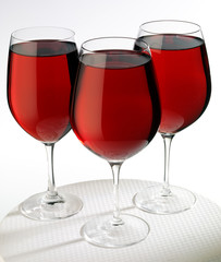 THREE GLASSES OF RED WINE