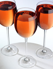 THREE GLASSES OF ROSE WINE
