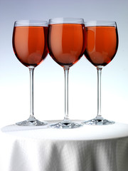 THREE GLASSES OF ROSE WINE