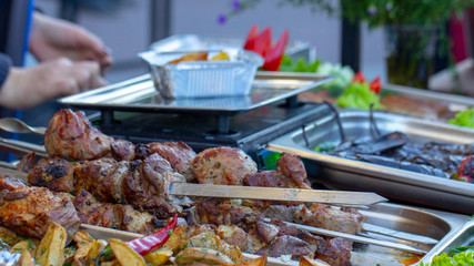 B-B-Q. vegetarian street food. Vegetables and fruits cooking on an open fire
