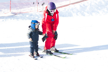 instructor child activity ski resort winter outfit