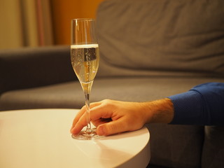 Champagne glass holding by a man