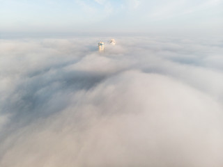 Aerial view of city covered with thick fog, Kyiv, Ukraine