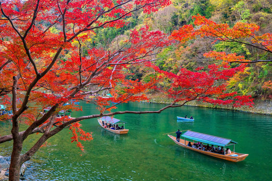 Colorful Arashiyama in autumn season along the river in Kyoto