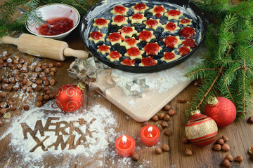 baking christmas star shape cookies. fresh dough and ingredients