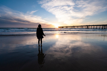 woman standing on a beach