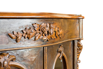 Detail of an ancient italian wooden furniture of the 19th century just restored on white background...
