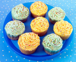 YELLOW AND BLUE CUPCAKES