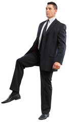 Businessman making a step - Isolated