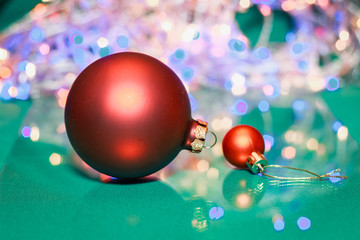 Abstract background with Christmas red toys for the new year.