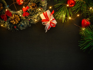 Dark Christmas background with small lights. Place for text. Blank for postcard or poster.