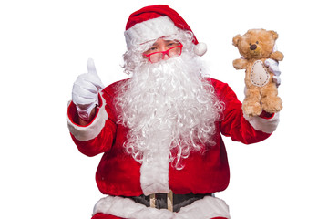 Portrait of santa claus with teddy bear doll on white background,Thailand people wear santa claus dress,Sent happiness for children,Merry christmas,Welcome to winter