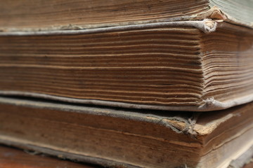 Yellowed pages of the old dilapidated book. Old book.