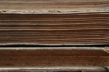 Yellowed pages of the old dilapidated book. Old book.