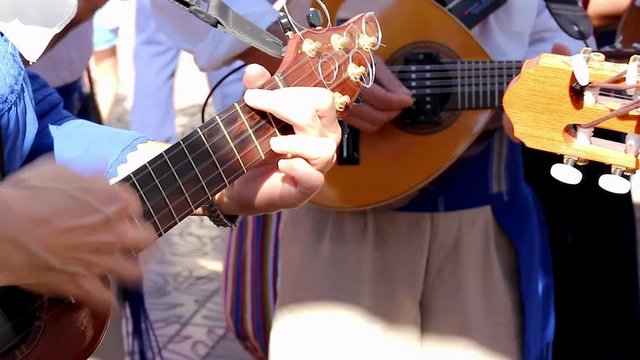 Gran Canaria island local band on traditional clothing playing music on special event. Spanish guitar players, party celebration concepts