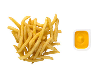 French fries on a white background. A pile of finished french fries close-up on a white background. Near the plastic container with cheese sauce.