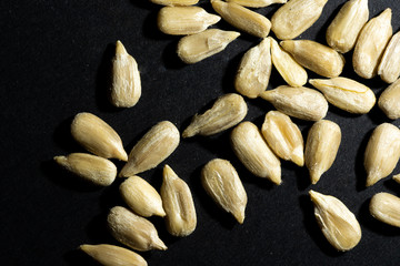 sunflower seeds on black background