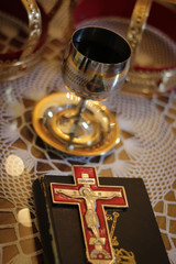 ortodox cross with glass of wine