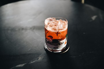Red cocktail with ice