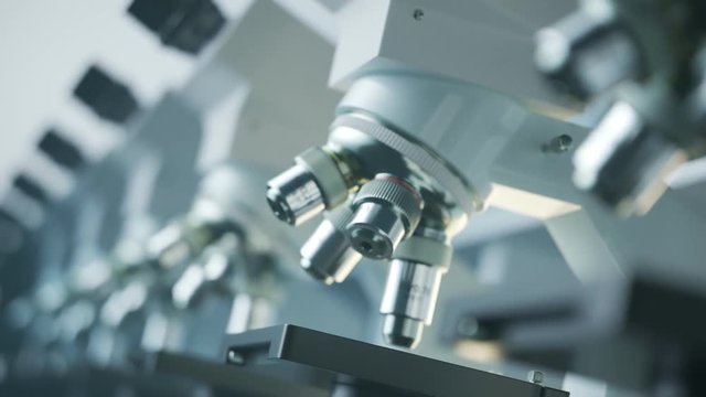 Countless modern microscopes in a row analysing samples in an endless loop. 4KHD