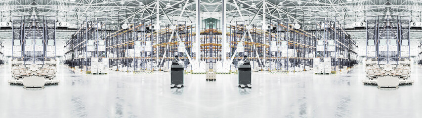 Fototapeta premium Blurred and de-focused industrial background. Typical storage, warehouse interior. Selective focus Wide panoramic image..