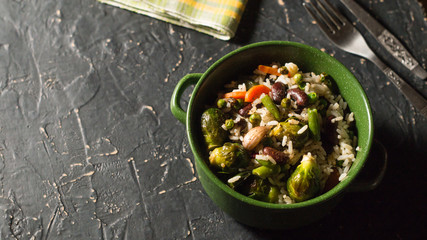 Bowl of stewed vegetables, beans and rice. Vegetarian food