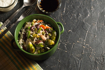 Bowl of stewed vegetables, beans and rice. Vegetarian food