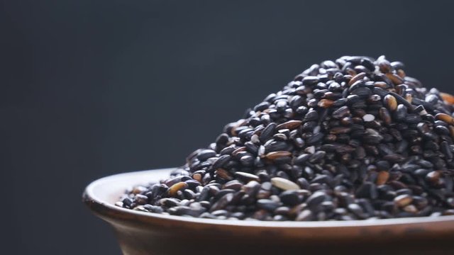 Black rice rotates. Close-up