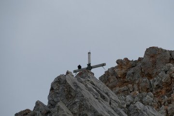 lonely summit cross on a mountain
