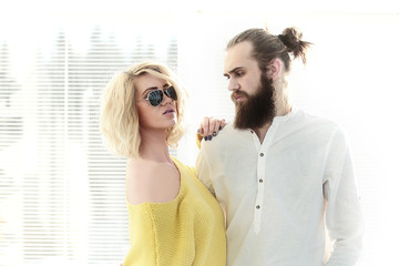 couple of fashion designers on window background in creative Studio