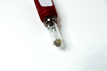 Dermis stamp electric pen. Dermapen. Needle mesotherapy treatment. 
