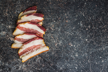 Sliced smoked bacon.