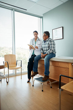 Doctor talking to man