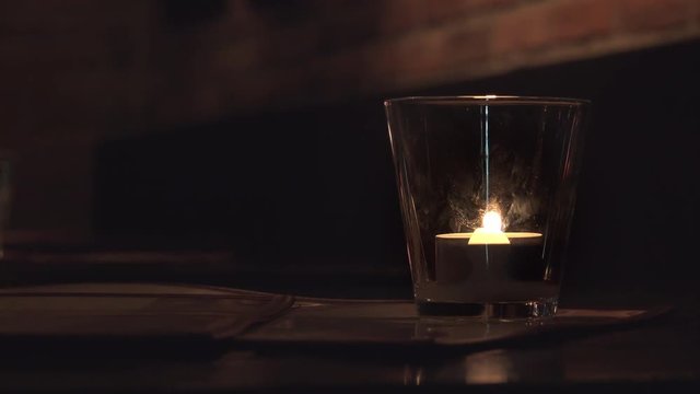 Candle light dinner at fancy restaurant.
