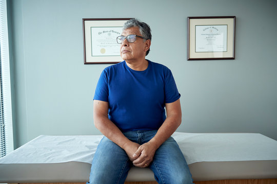 Man waiting inside doctor's office