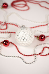 Fototapeta na wymiar White and red Christmas balls on white background