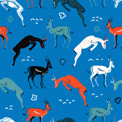 Seamless antelopes pattern in african style.  Primitive colorful illustration for textile, fabric, fashion clothes. African animal illustration isolated on background - 235990578
