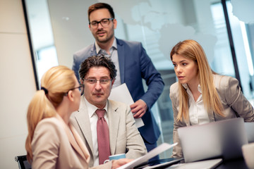 Manager and business team talking in the office