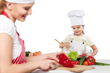 Mother and Daughter Cooking Together Isolated