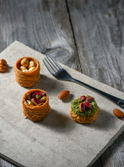 Delight sweets on white rustic background. Turkish deligh set. Assorted traditional turkish delight on light background