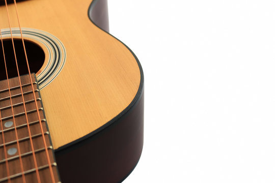 Close up of an acoustic guitar.isolated on a white background