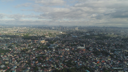 Aerial view of Manila city with skyscrapers and buildings. Philippines, Luzon. Aerial skyline of Manila.