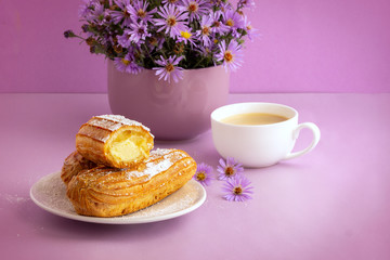 appetizing cakes on a lilac background
