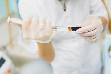 Obraz na płótnie Canvas Set of preparation of blood plasma from the test tube in a syringe of blood plasma.