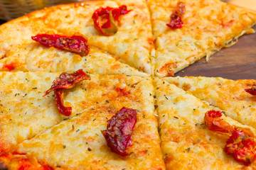 Delicious pizza with crispy crust and parmesan.