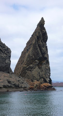Fototapeta na wymiar Pinnacle Rock on the coastline of Bartolome Island, Galapagos Islands