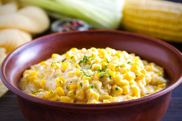Sweet and creamy corn in bowl. Corn dish. horizontal