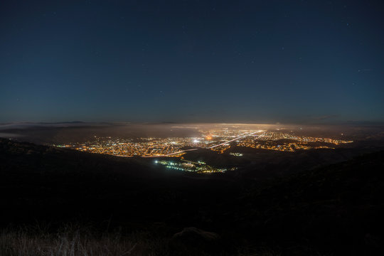 Foggy night hilltop view of suburban Simi Valley near Los Angeles in Ventura County California.
