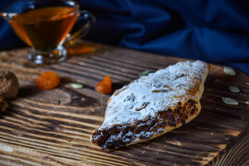 National Georgian dessert. Rols with lemon honey and dried fruits.