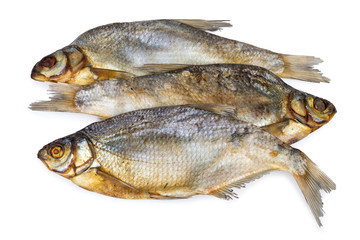 Three dried salted fishes isolated on white